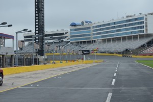 Pit row looking down at Turn 1 - 24 deg banking